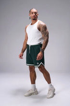Green GTS Evolve Mesh 8 Inch Shorts showing athletic side silhouette, zip pocket storage, and lightweight mesh fabric by TLF Apparel – side view