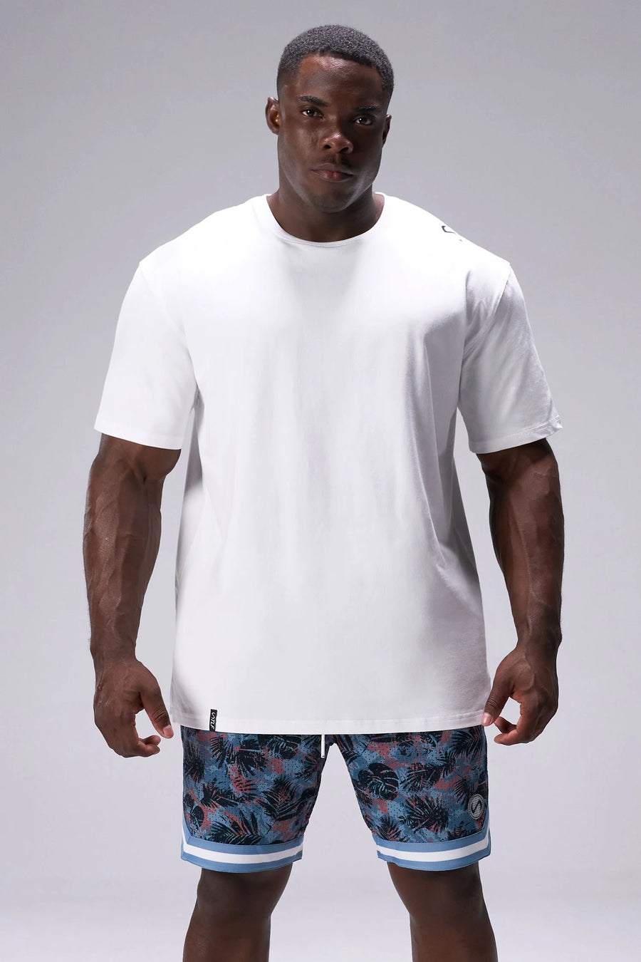 Palm Print GTS Evolve Mesh 8 Inch Shorts with athletic relaxed fit, zip pockets, and lightweight mesh fabric for training and everyday wear by TLF Apparel – front view