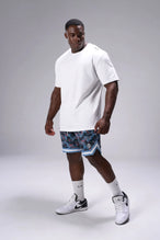 Palm Print GTS Evolve Mesh 8 Inch Shorts showing athletic side silhouette, zip pocket storage, and lightweight mesh fabric by TLF Apparel – side view