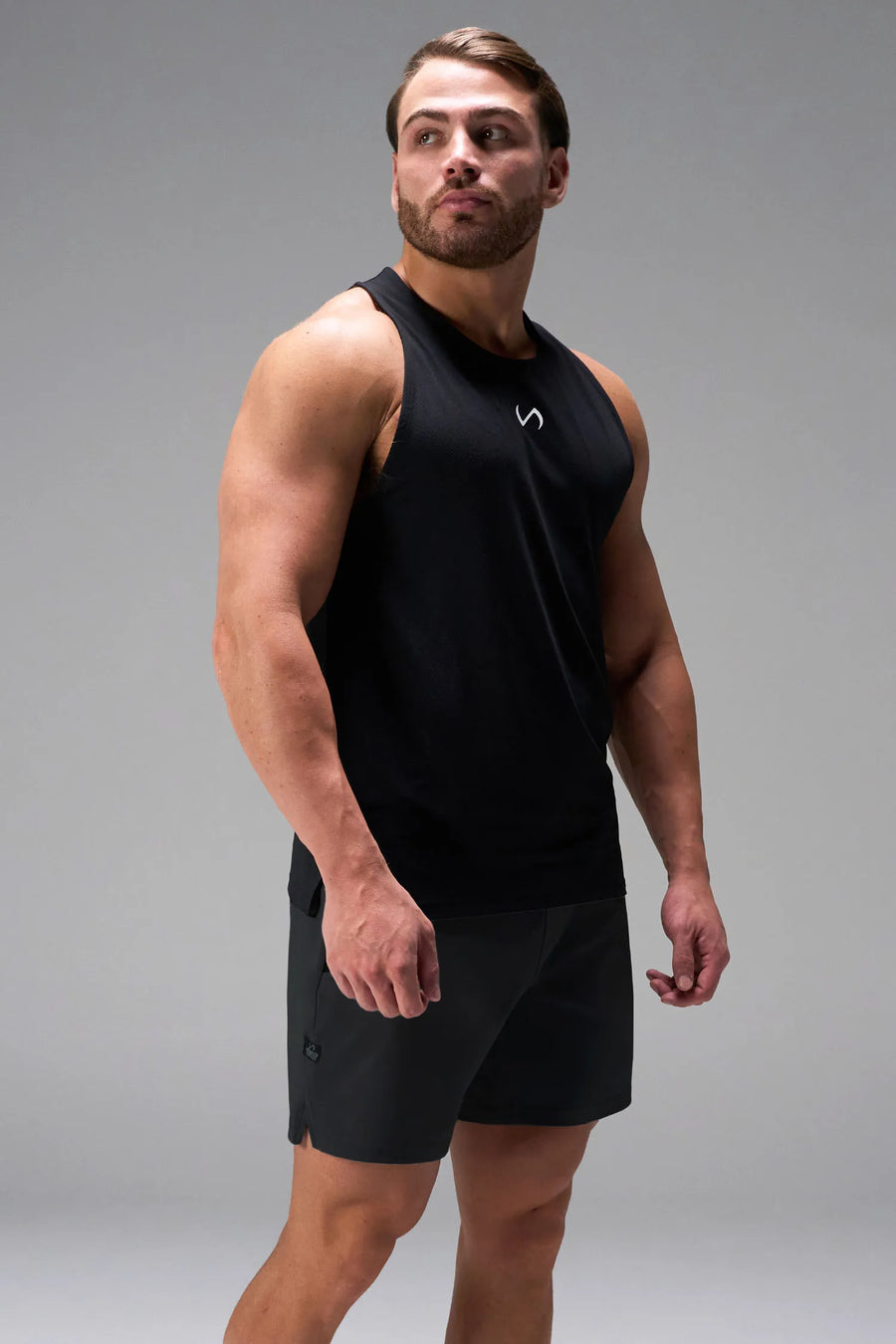 Black men’s Apex 365 7 Inch Shorts feature a 7 inch inseam, designed for training, and all-day gym to street wear by TLF Apparel – details view 