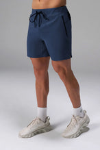 Blue men’s Apex 365 7 Inch Shorts feature a 7 inch inseam, designed for training, and all-day gym to street wear by TLF Apparel – front view 