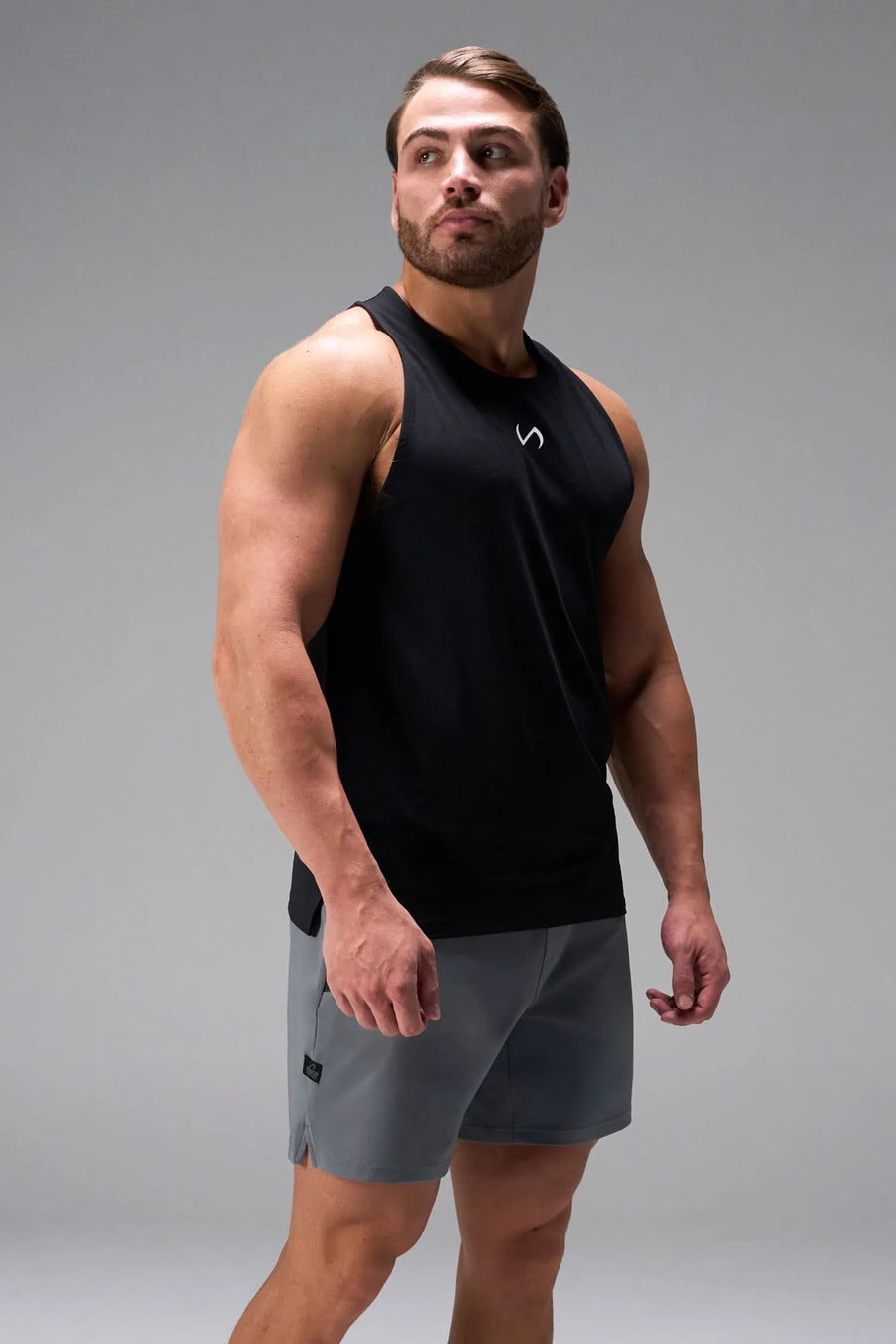 Gray men’s Apex 365 7 Inch Shorts feature a 7 inch inseam, designed for training, and all-day gym to street wear by TLF Apparel – details view 