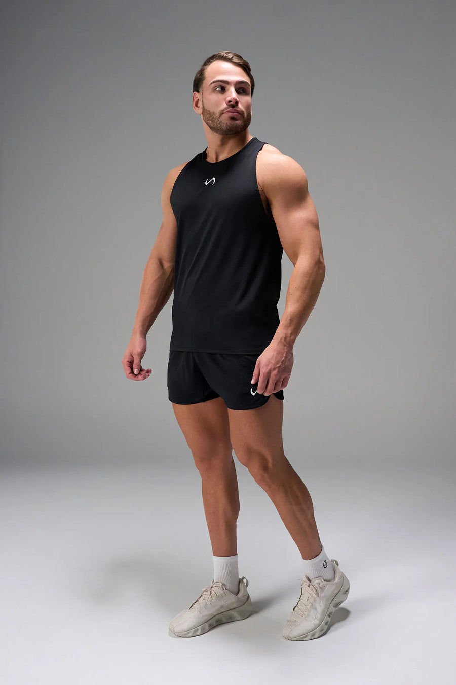Black Men’s Micro Mesh 5 Inch Shorts with 7-inch inseam, designed for gym training, HIIT workouts and running by TLF Apparel – front view 