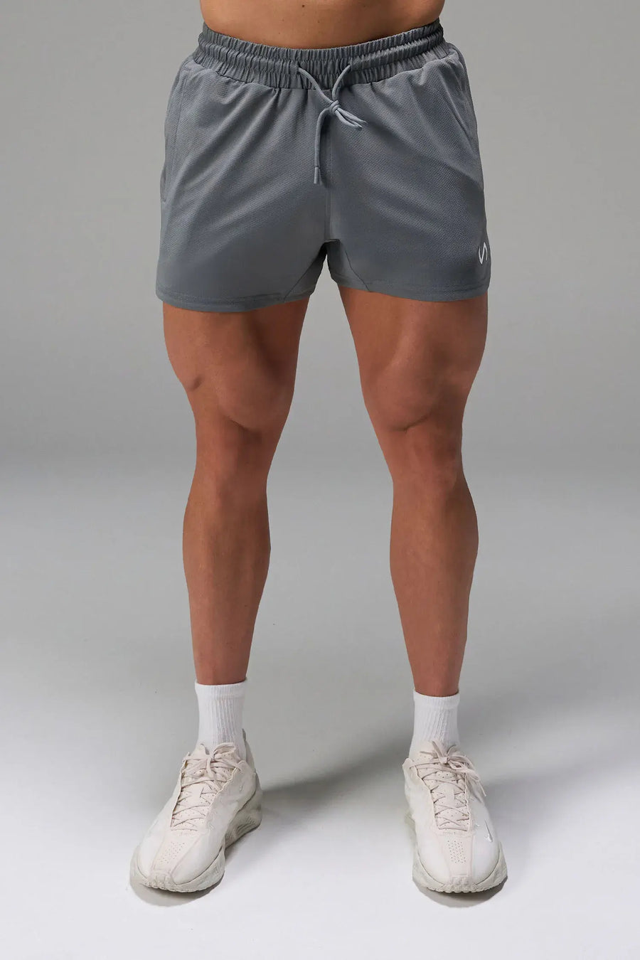 Gray Men’s Micro Mesh 5 Inch Shorts with 7-inch inseam, designed for gym training, HIIT workouts and running by TLF Apparel – front view 