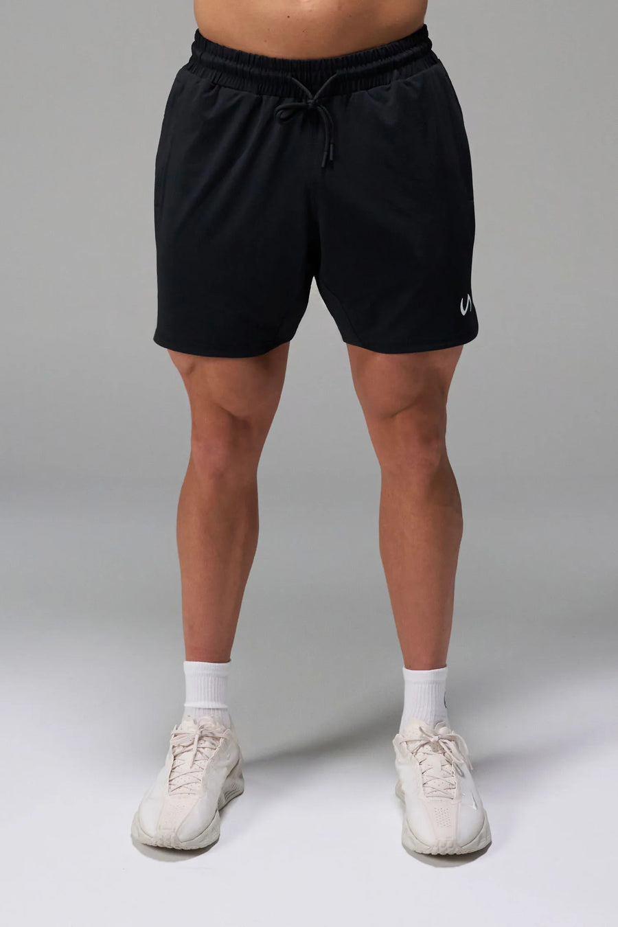 Black Men’s Micro Mesh 7 Inch Shorts with 7-inch inseam, designed for gym training, HIIT workouts and running by TLF Apparel – front view 
