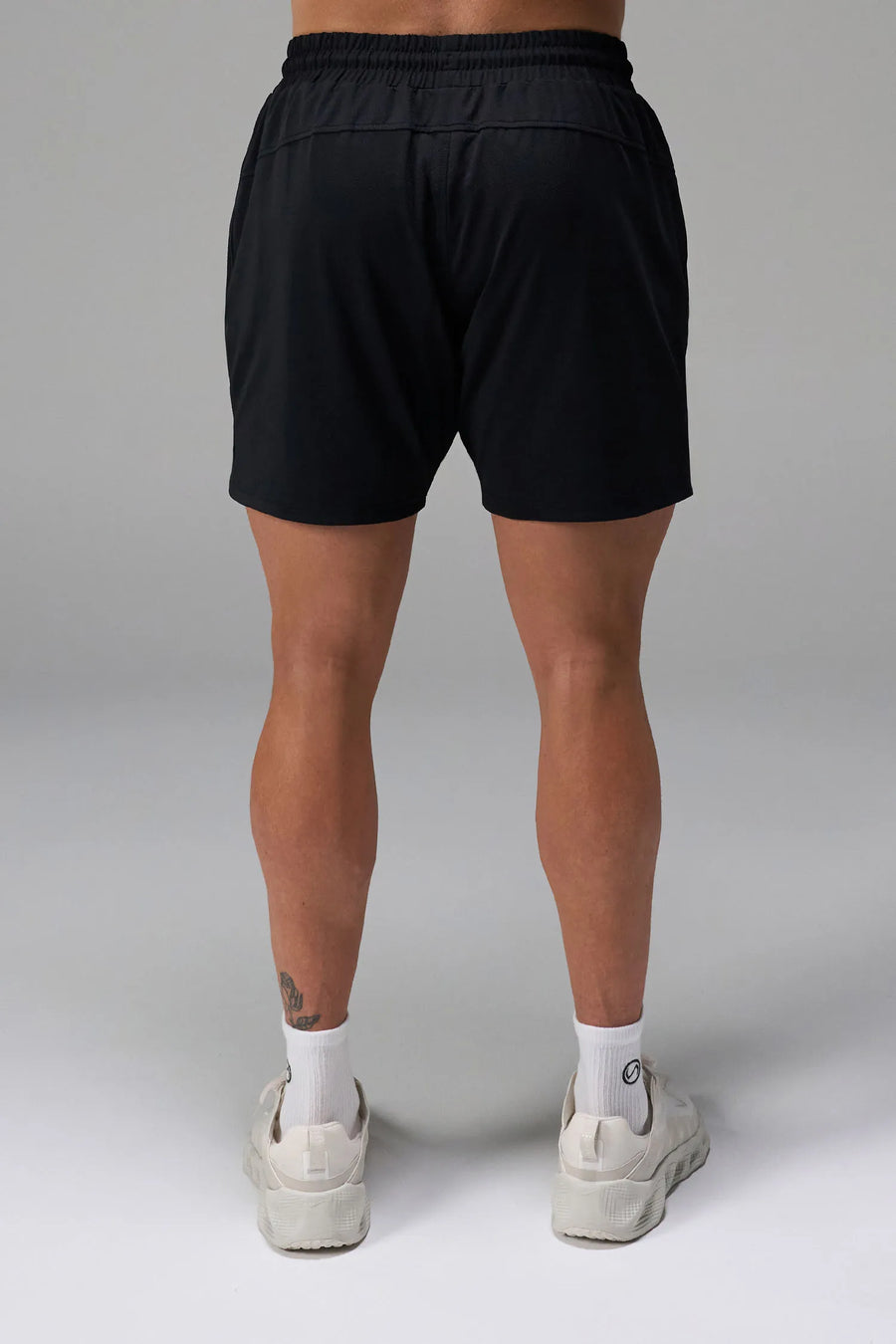 Black Men’s Micro Mesh 7 Inch Shorts with 7-inch inseam, designed for gym training, HIIT workouts and running by TLF Apparel – back view 