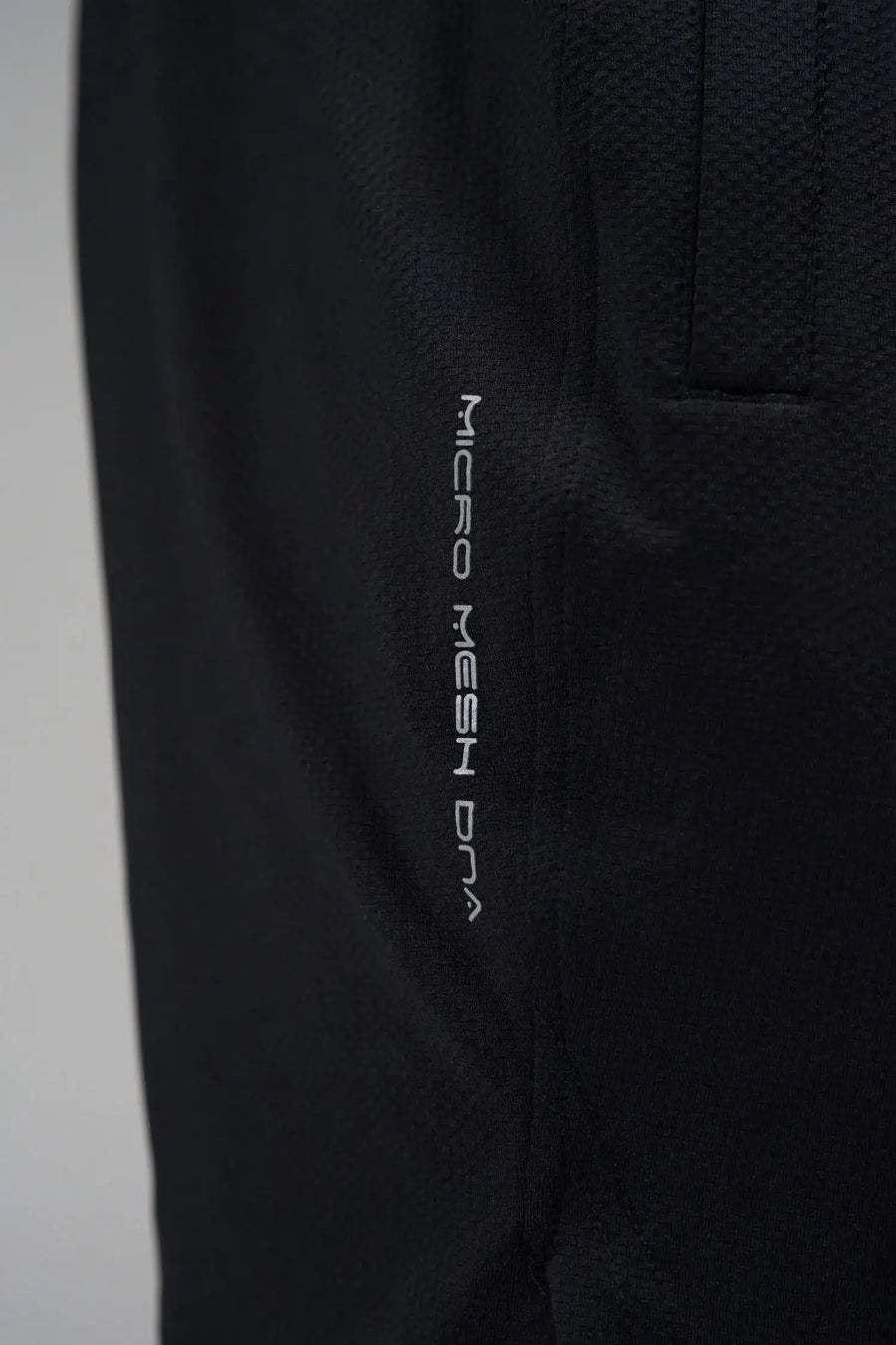 Black Men’s Micro Mesh 7 Inch Shorts with 7-inch inseam, designed for gym training, HIIT workouts and running by TLF Apparel – detail view 