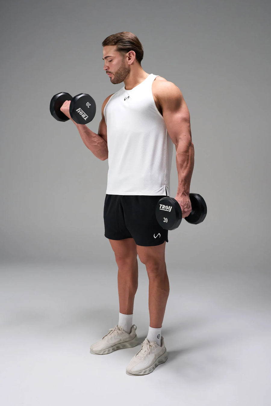 Black Men’s Micro Mesh 7 Inch Shorts with 7-inch inseam, designed for gym training, HIIT workouts and running by TLF Apparel – front view 