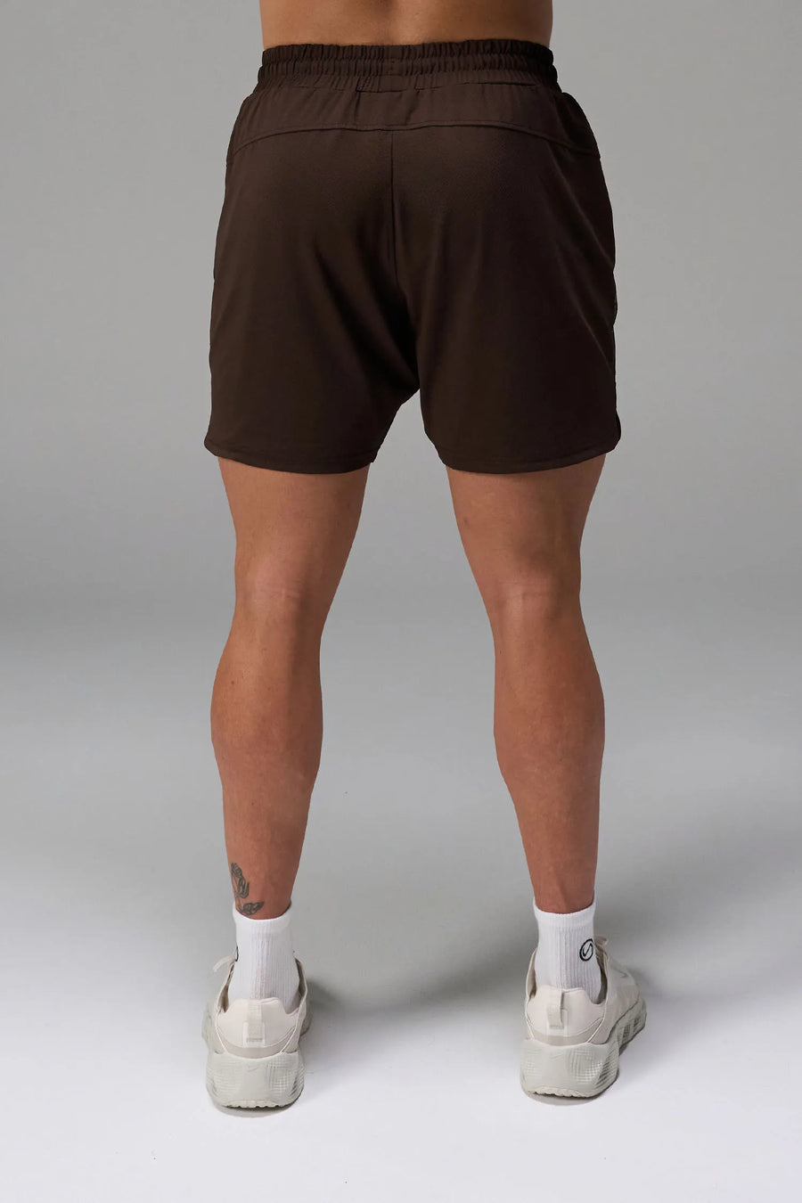 Brown Men’s Micro Mesh 7 Inch Shorts with 7-inch inseam, designed for gym training, HIIT workouts and running by TLF Apparel – back view 