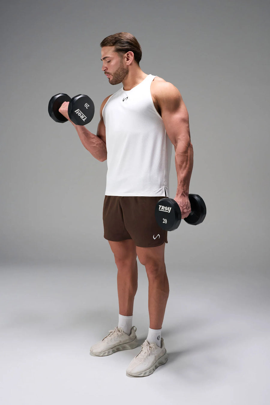Brown Men’s Micro Mesh 7 Inch Shorts with 7-inch inseam, designed for gym training, HIIT workouts and running by TLF Apparel – front view 