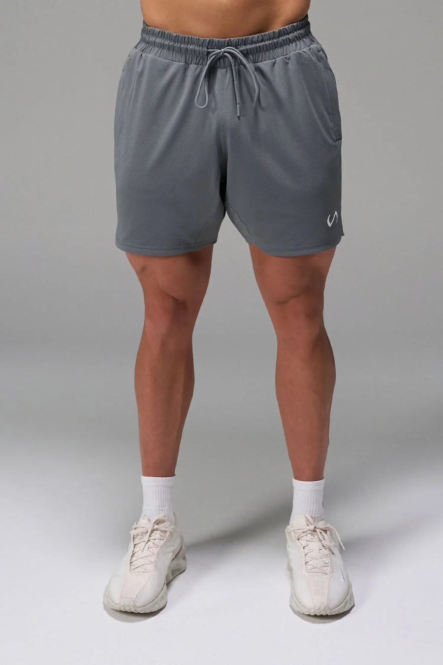 Gray Men’s Micro Mesh 7 Inch Shorts with 7-inch inseam, designed for gym training, HIIT workouts and running by TLF Apparel – front view 