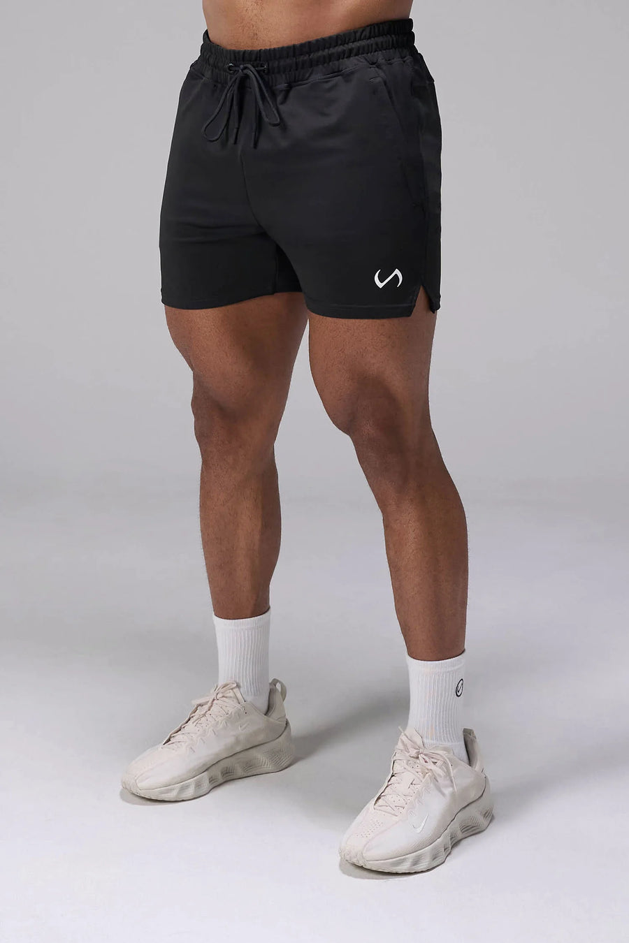 Black Adapt Performance 5 inch Shorts with durable 4-way stretch performance fabric and secure zipper pockets for training and gym workouts by TLF Apparel – front view