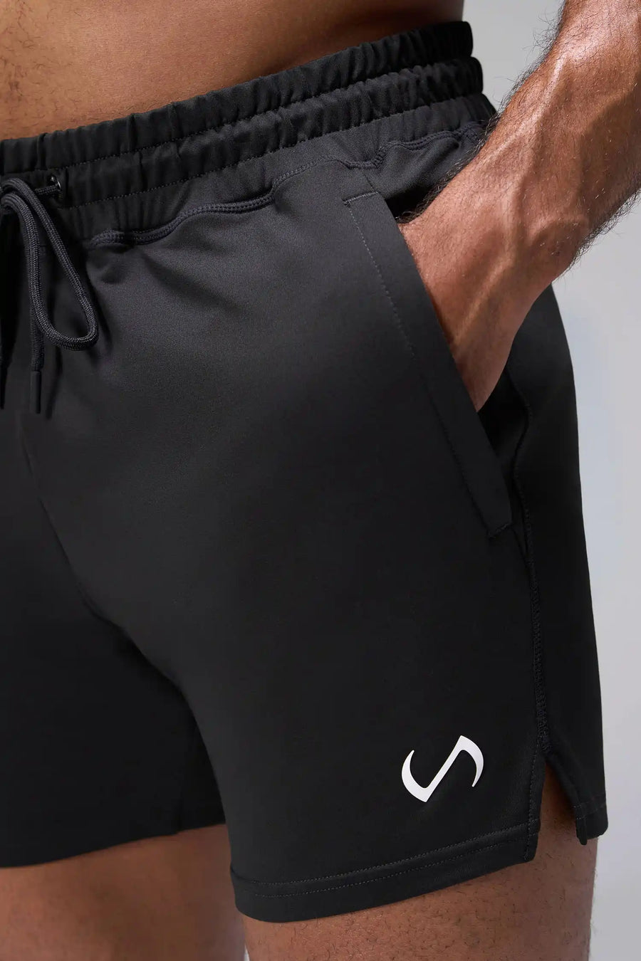Black Adapt Performance 5 inch Shorts showing durable knit performance fabric and zipper pocket detail by TLF Apparel – detail view
