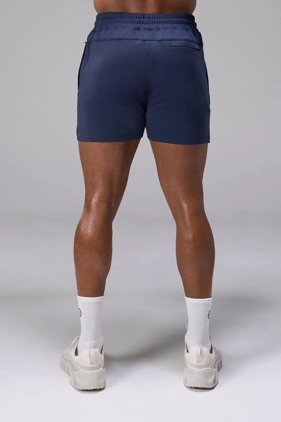 Blue Adapt Performance 5 inch Shorts showing rear fit and secure zipper pocket for training and everyday wear by TLF Apparel – back view
