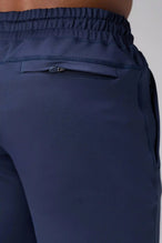 Blue Adapt Performance 5 inch Shorts showing durable knit performance fabric and back zipper pocket detail by TLF Apparel – detail view