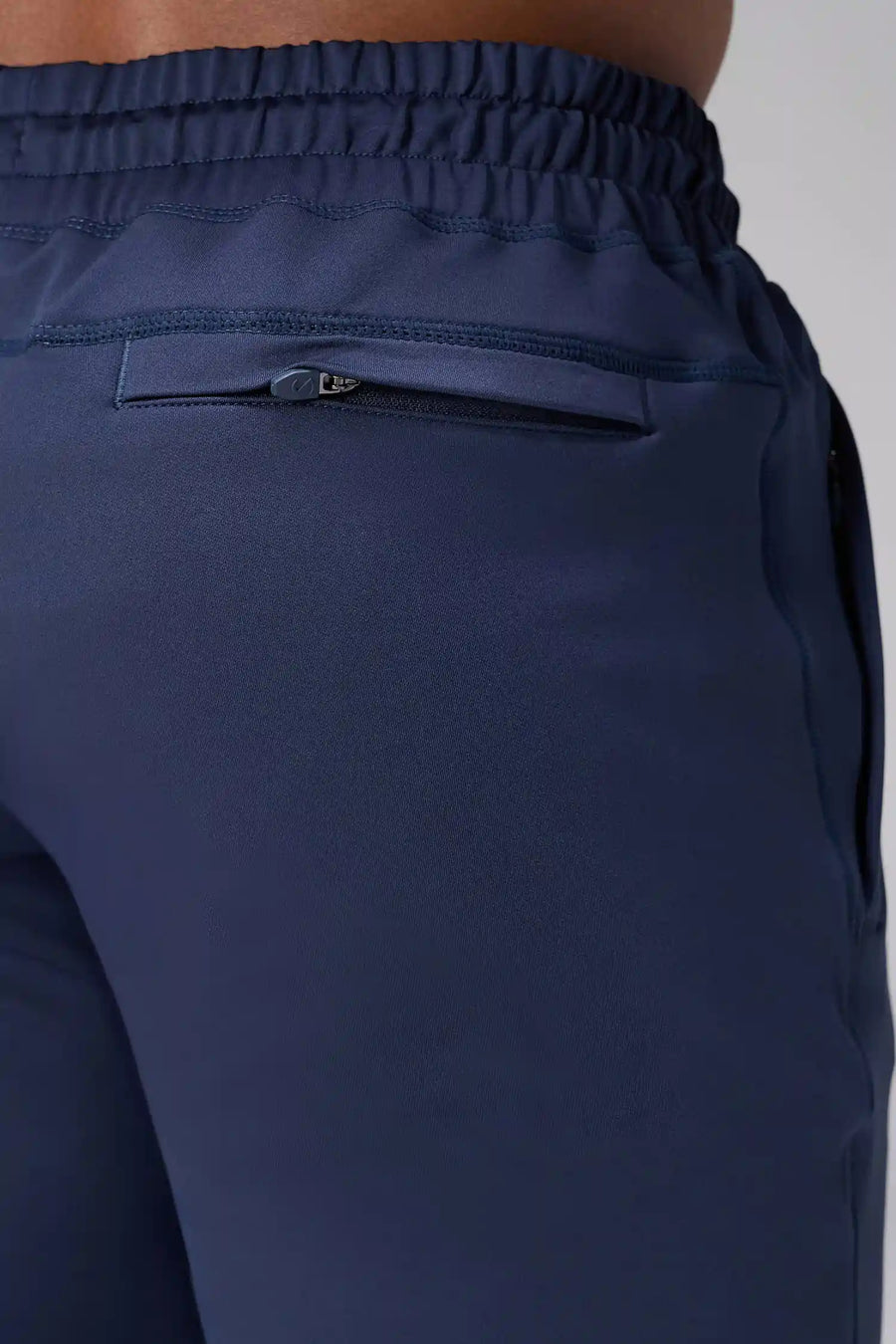 Blue Adapt Performance 5 inch Shorts showing durable knit performance fabric and back zipper pocket detail by TLF Apparel – detail view