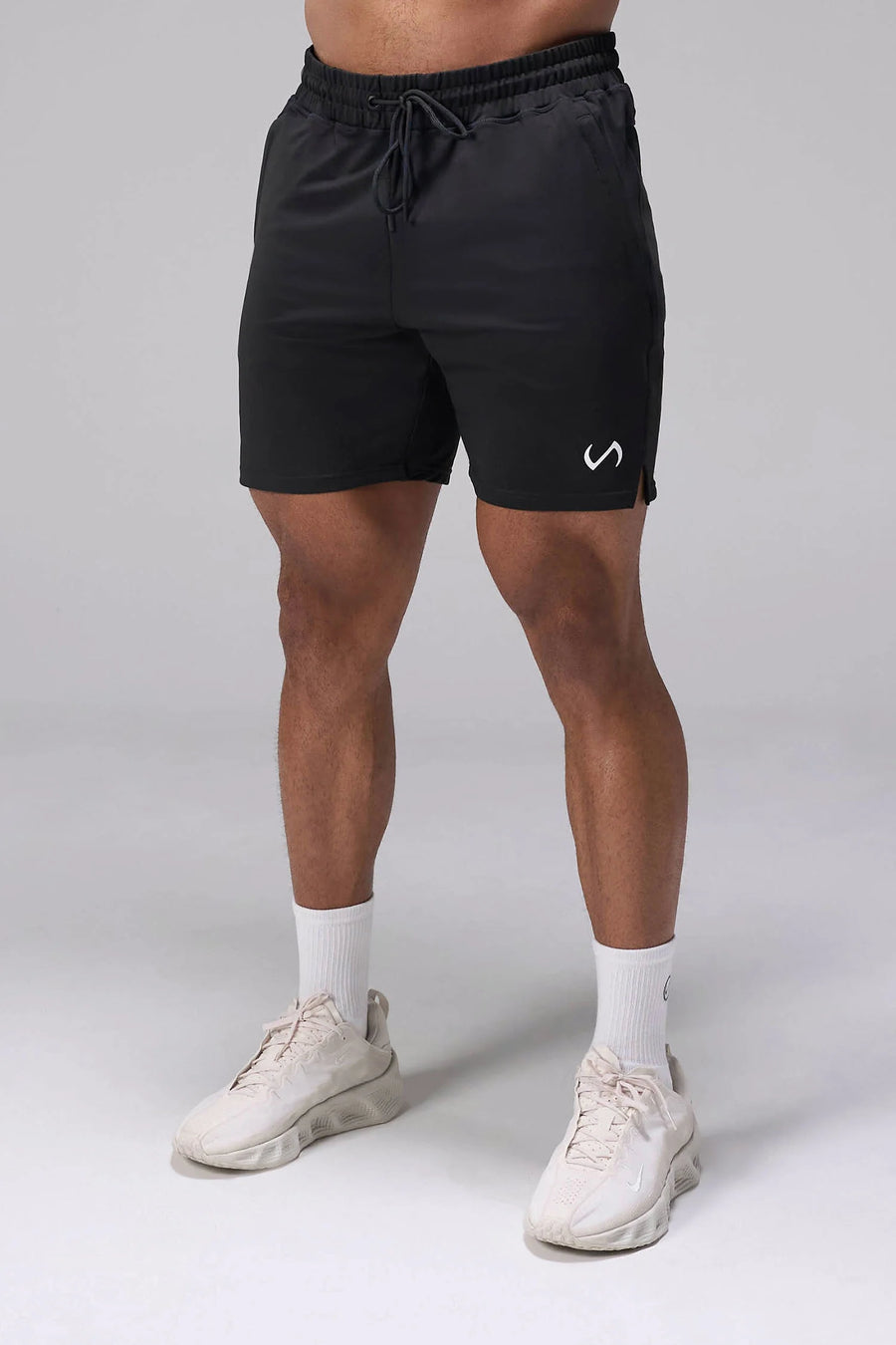Black Adapt Performance 7 Inch Shorts with durable 4-way stretch performance fabric and secure zipper pockets for training and gym workouts by TLF Apparel – front view 