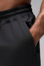 Black Adapt Performance 7 Inch Shorts showing durable knit performance fabric and zipper pocket detail by TLF Apparel – detail view