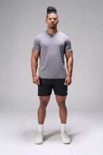Black Adapt Performance 7 Inch Shorts with 4-way stretch performance fabric and secure zipper pockets for workouts and gym training by TLF Apparel – front view