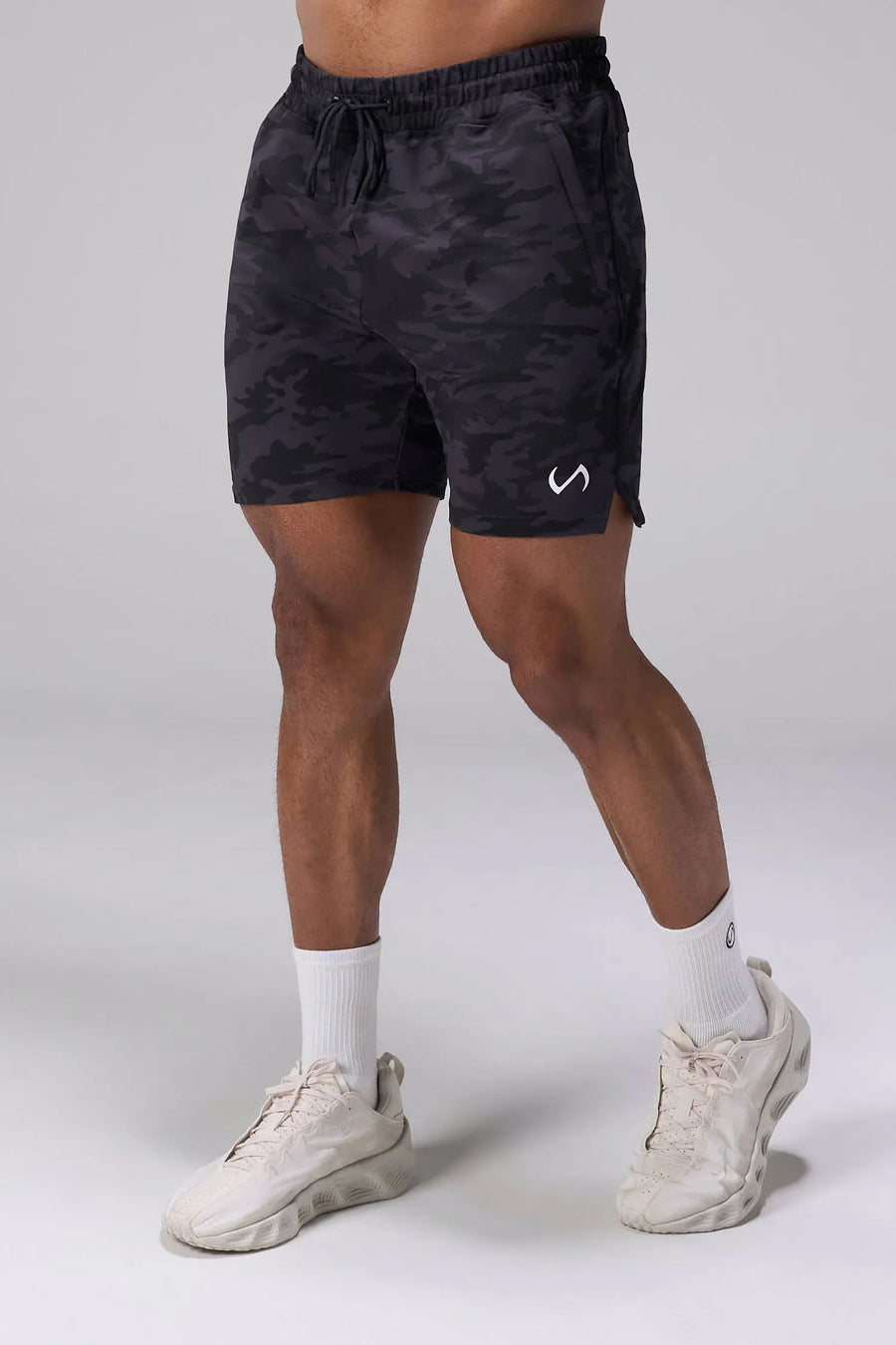 Black Tonal Camo Adapt Performance 7 Inch Shorts with durable 4-way stretch performance fabric and secure zipper pockets for training and gym workouts by TLF Apparel – front view 