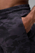 Black Tonal Camo Adapt Performance 7 Inch Shorts showing tonal camo jacquard knit texture and zipper pocket detail by TLF Apparel – detail view