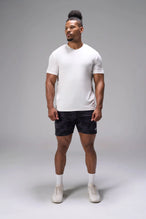 Black Tonal Camo Adapt Performance 7 Inch Shorts with 4-way stretch performance fabric and secure zipper pockets for workouts and gym training by TLF Apparel – front view