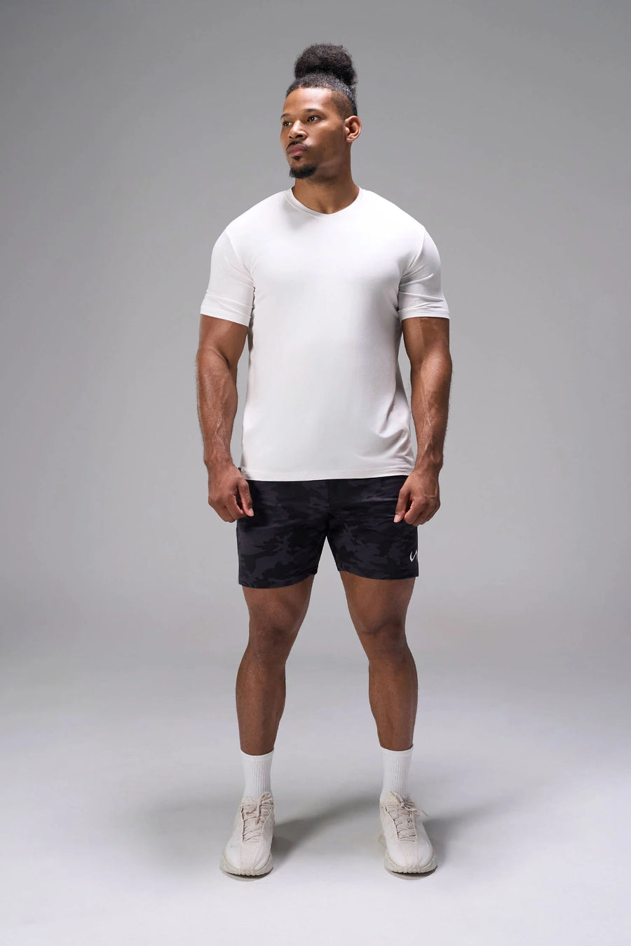 Black Tonal Camo Adapt Performance 7 Inch Shorts with 4-way stretch performance fabric and secure zipper pockets for workouts and gym training by TLF Apparel – front view