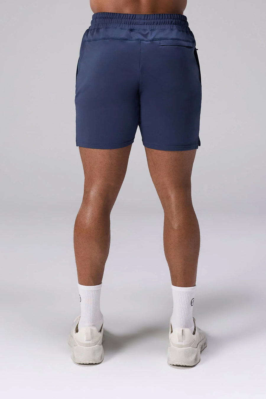 Blue Adapt Performance 7 Inch Shorts showing rear fit and secure zipper pocket for training and everyday wear by TLF Apparel – back view