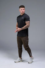Front View of Brown TLF Element Athletic Joggers 2.0, featuring side zipper pockets and side leg cargo pockets and reflective details 