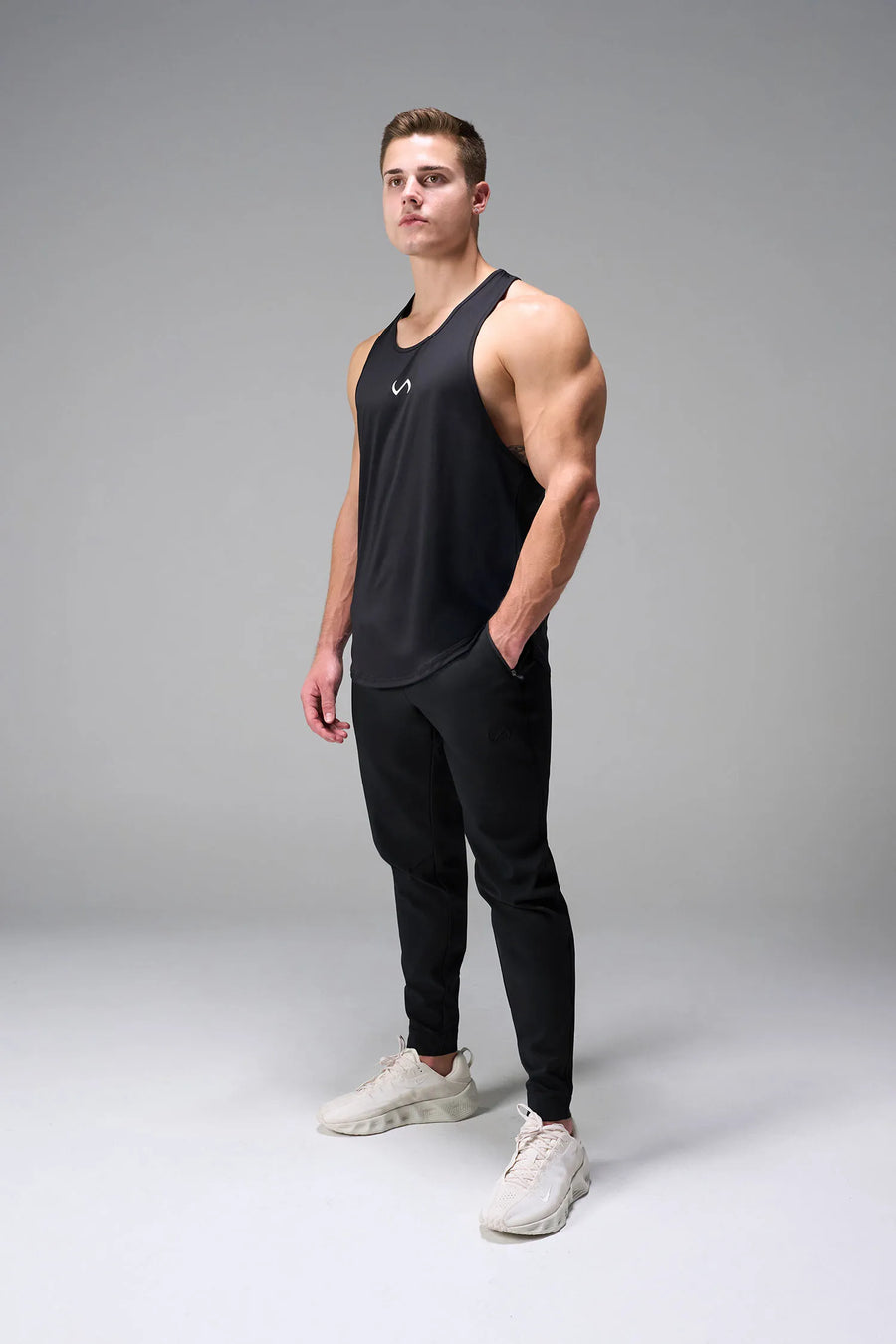Black men’s Apex 365 Joggers feature a tapered fit, designed for training, and all-day gym to street wear by TLF Apparel – front view