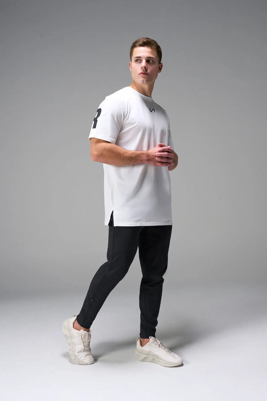 Black men’s Apex 365 Joggers feature a tapered fit, designed for training, and all-day gym to street wear by TLF Apparel – front view