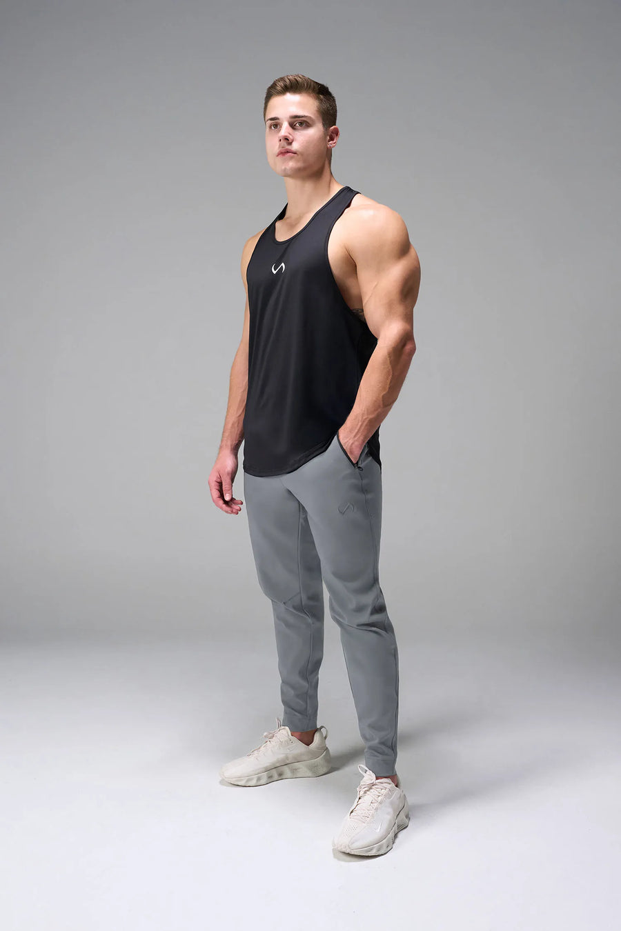 Gray men’s Apex 365 Joggers feature a tapered fit, designed for training, and all-day gym to street wear by TLF Apparel – front view