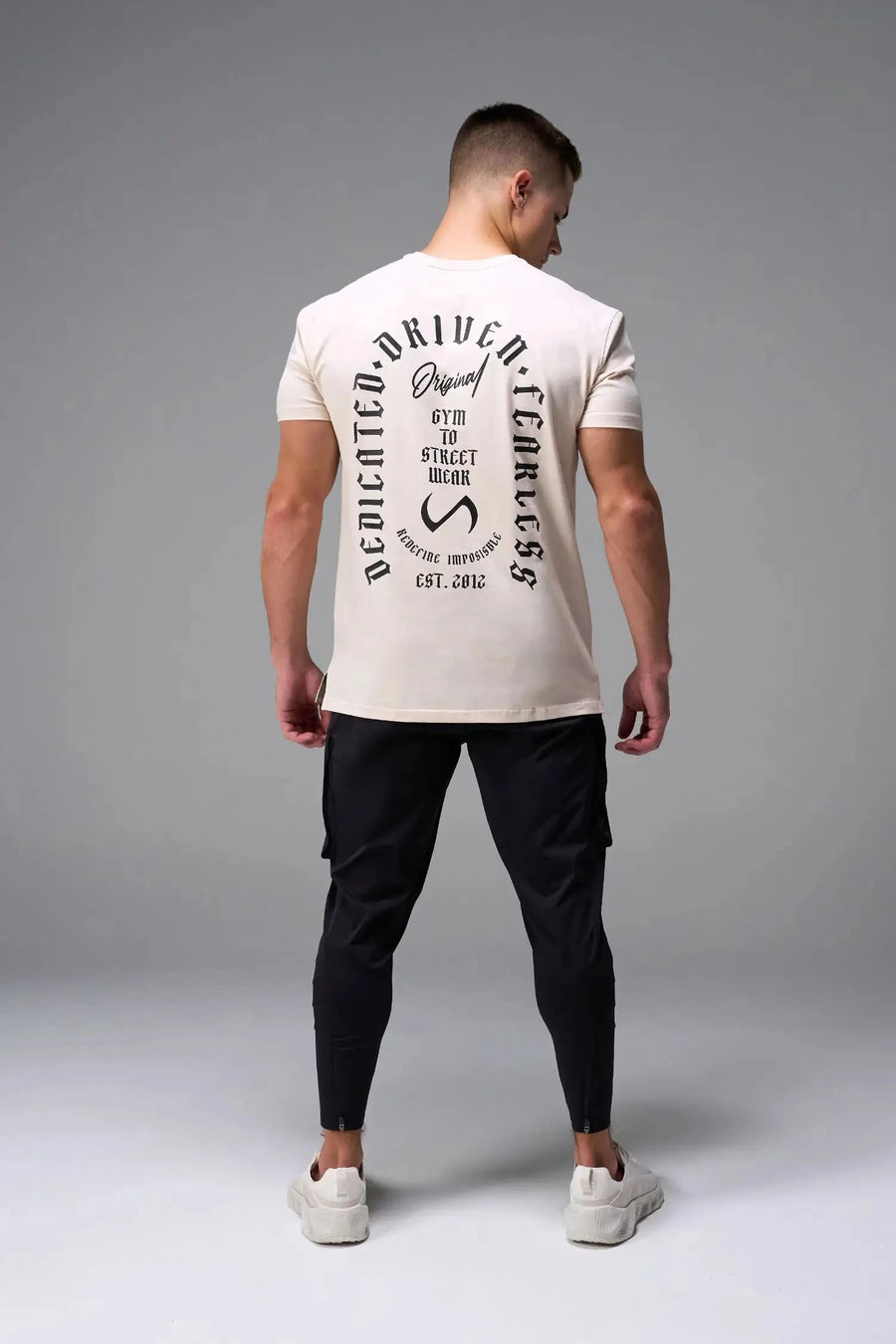 Back View of White TLF 3 Strengths Swole Tee, featuring a custom graphic print design in our swole fit for all day wear