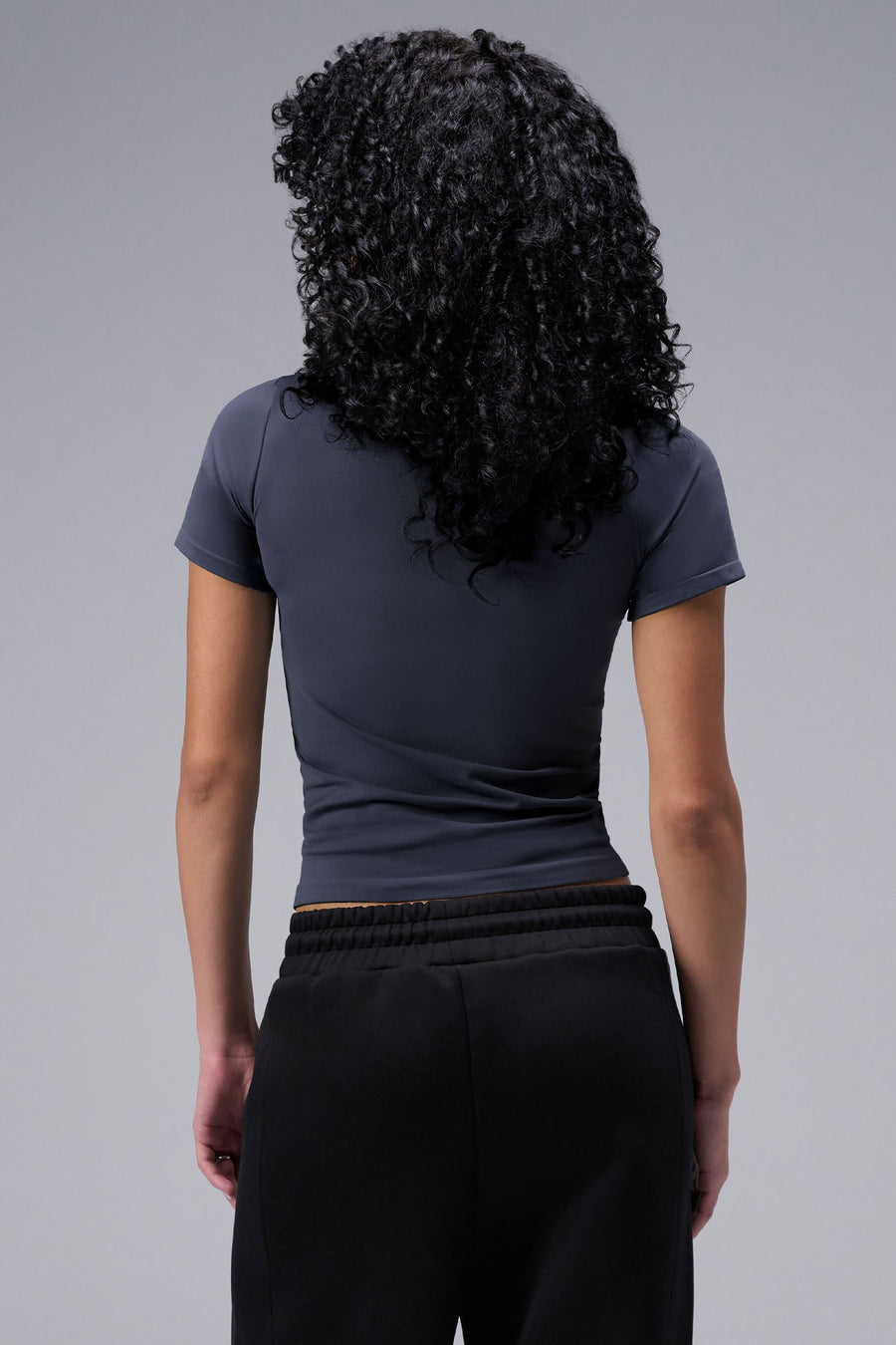 Women’s armada essential seamless short sleeve top with contouring fit for gym and lifestyle by TLF Apparel – back view