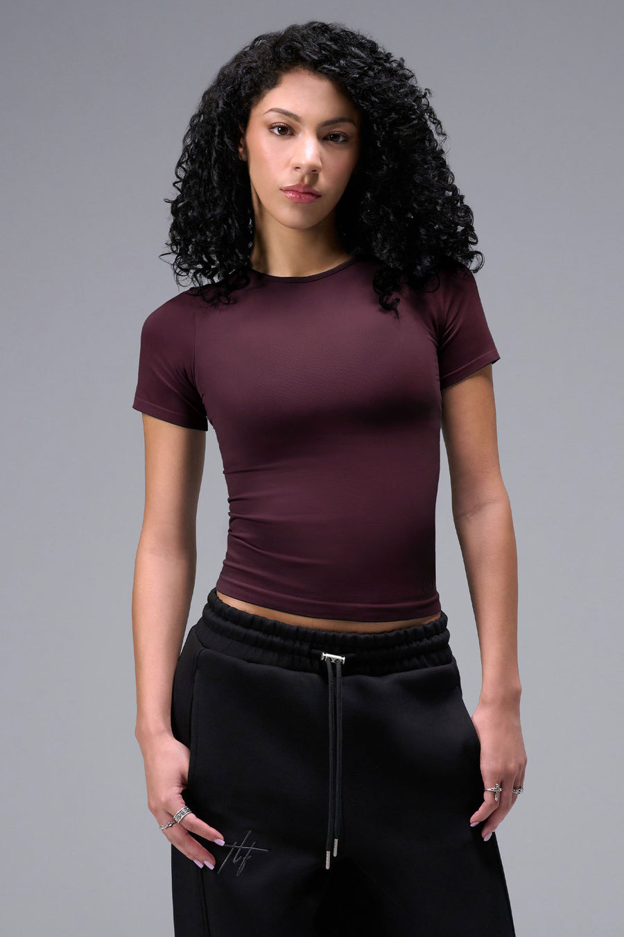 Women’s wine essential seamless short sleeve top with contouring fit for gym and lifestyle by TLF Apparel – main front view