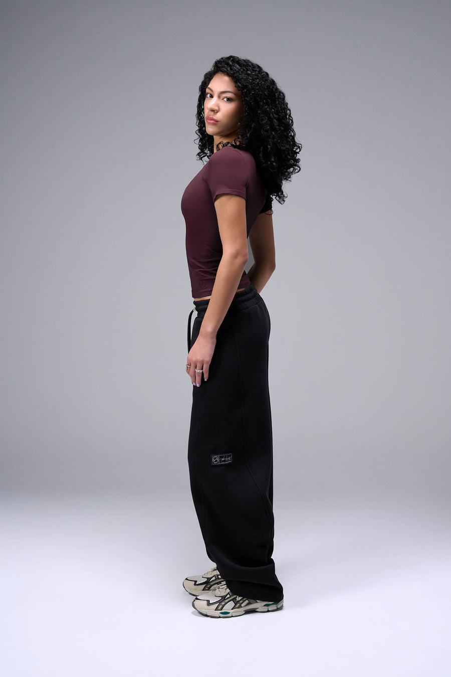 Women’s wine essential seamless short sleeve top with contouring fit for gym and lifestyle by TLF Apparel – side view