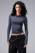 Women’s armada essential seamless long sleeve top with contouring fit for gym and lifestyle by TLF Apparel – main front view