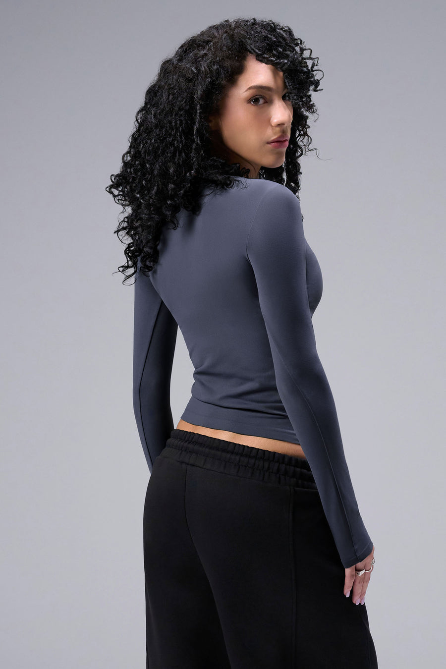 Women’s armada essential seamless long sleeve top with contouring fit for gym and lifestyle by TLF Apparel – back view