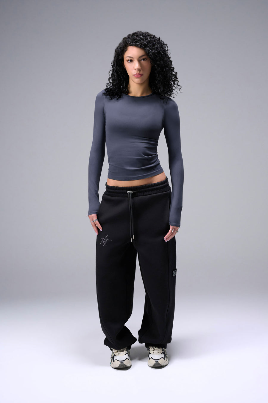 Women’s armada essential seamless long sleeve top with contouring fit for gym and lifestyle by TLF Apparel – full body front view