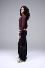 Women’s wine essential seamless long sleeve top with contouring fit for gym and lifestyle by TLF Apparel – side view