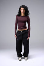 Women’s wine essential seamless long sleeve top with contouring fit for gym and lifestyle by TLF Apparel – full body front view