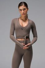 Brown NeoCloud™ wrap top with long sleeves and wrap design for multiple styling options by TLF Apparel – front view 