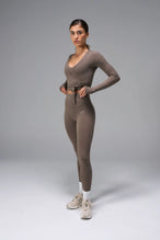 Brown NeoCloud™ wrap top with long sleeves and wrap design for multiple styling options by TLF Apparel – front view 