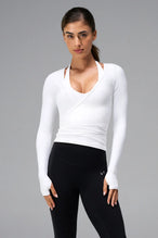 White NeoCloud™ wrap top with long sleeves and wrap design for multiple styling options by TLF Apparel – front view 