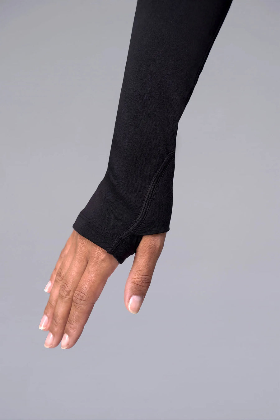 Black Cosmic Seamless 1/4 Zip showing fitted side silhouette and sculpting seamless fabric by TLF Apparel – detail view