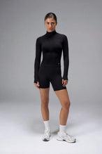Black Cosmic Seamless 1/4 Zip with raglan sleeves and seamless sculpting fit for workouts and training by TLF Apparel – front view 