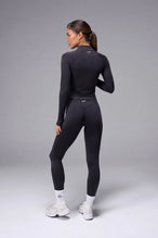 Black Cosmic Seamless 1/4 Zip showing seamless contour knit fabric and quarter zip neckline detail by TLF Apparel – back view 