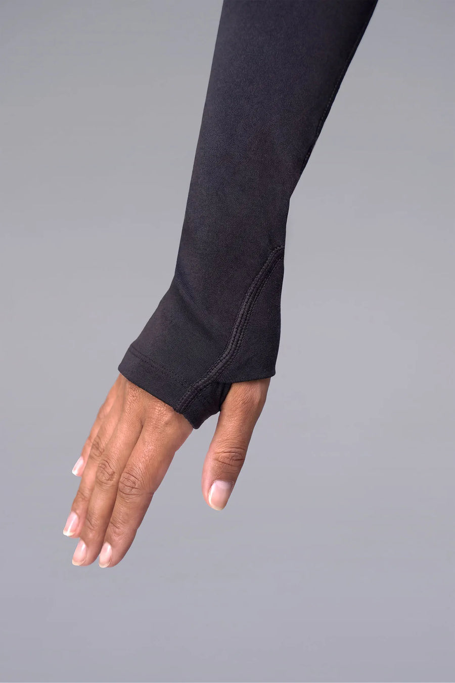 Black Cosmic Seamless 1/4 Zip showing fitted side silhouette and sculpting seamless fabric by TLF Apparel – detail view