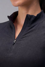 Black Cosmic Seamless 1/4 Zip showing sculpted side fit and breathable seamless knit fabric by TLF Apparel – detail view 