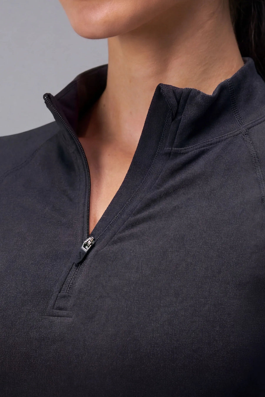 Black Cosmic Seamless 1/4 Zip showing sculpted side fit and breathable seamless knit fabric by TLF Apparel – detail view 
